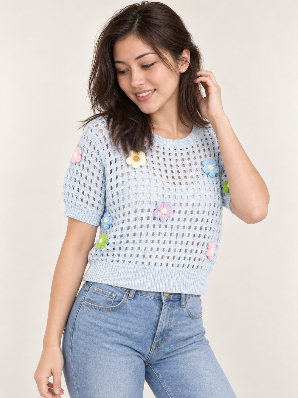 Flower Open Knit Short Sleeve Top Blue angled view on model