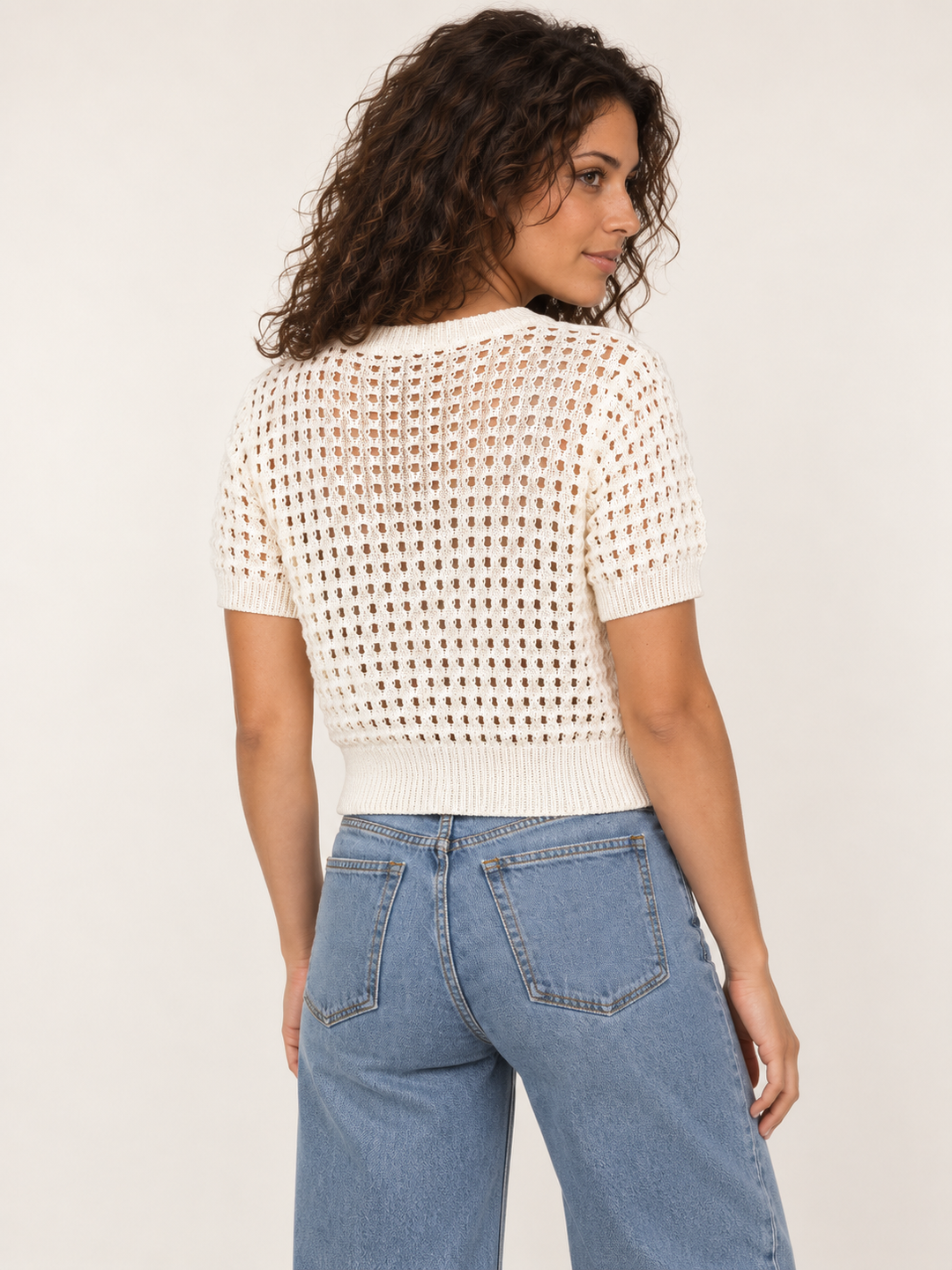 Model wearing Flower Open Knit Short Sleeve Top Ivory, back view