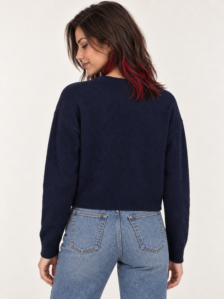 Model wearing Fox Cardigan Navy, back view