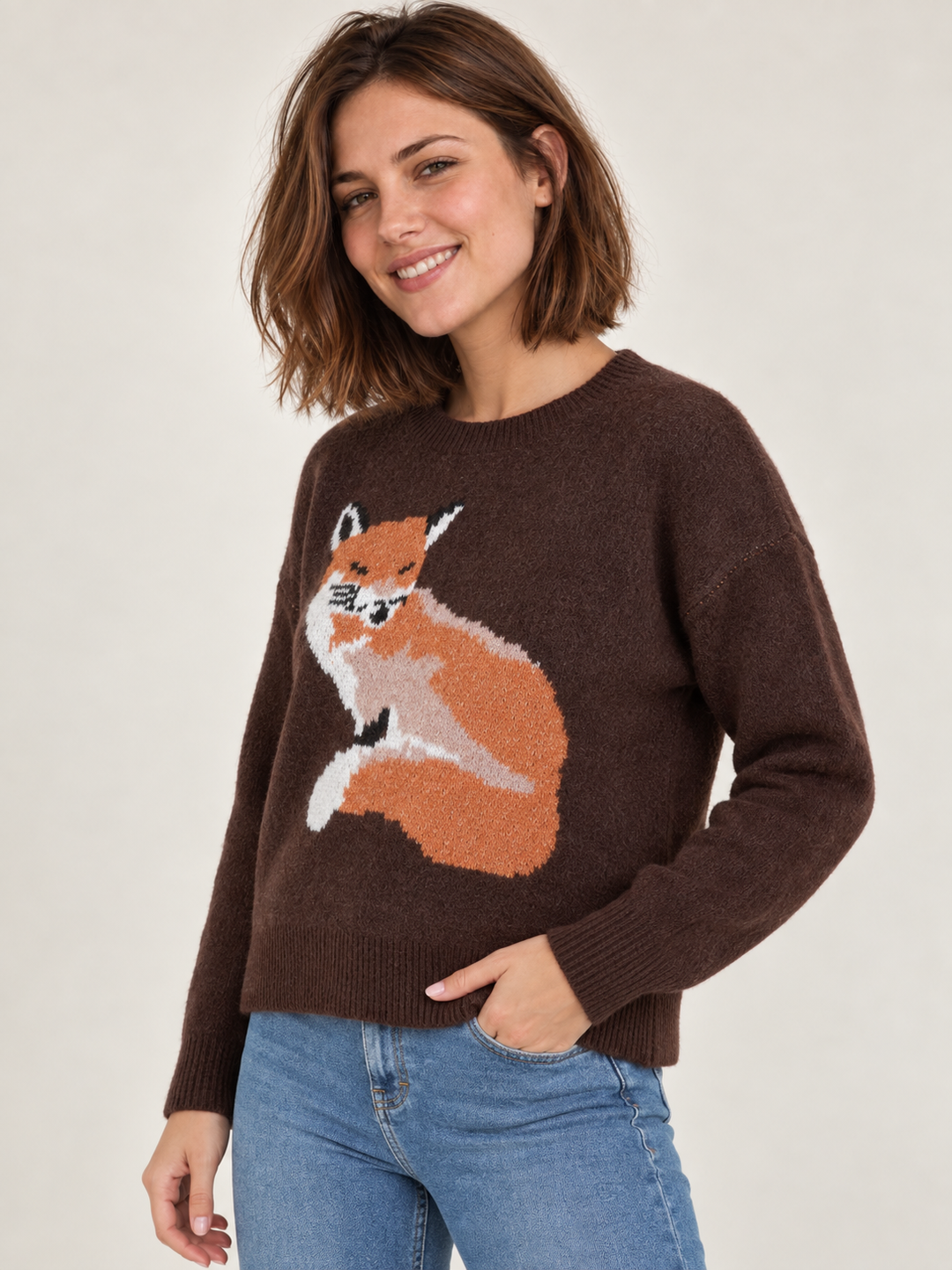 Model wearing Fox Graphic Sweater Brown, 45-degree view