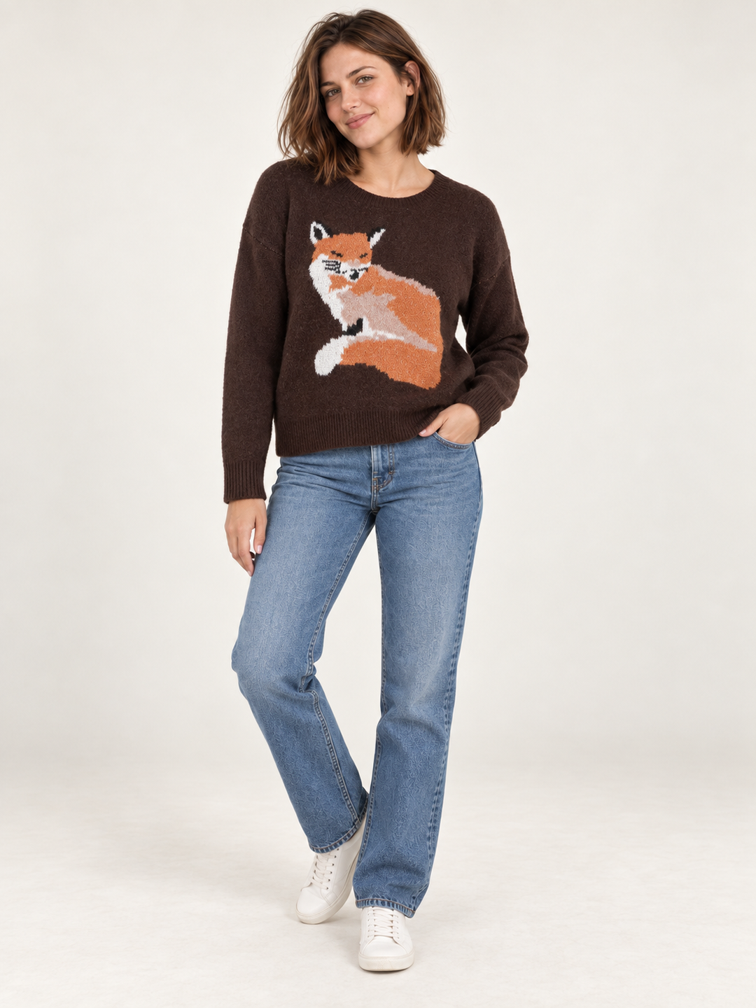 Model wearing Fox Graphic Sweater Brown, full-body front view