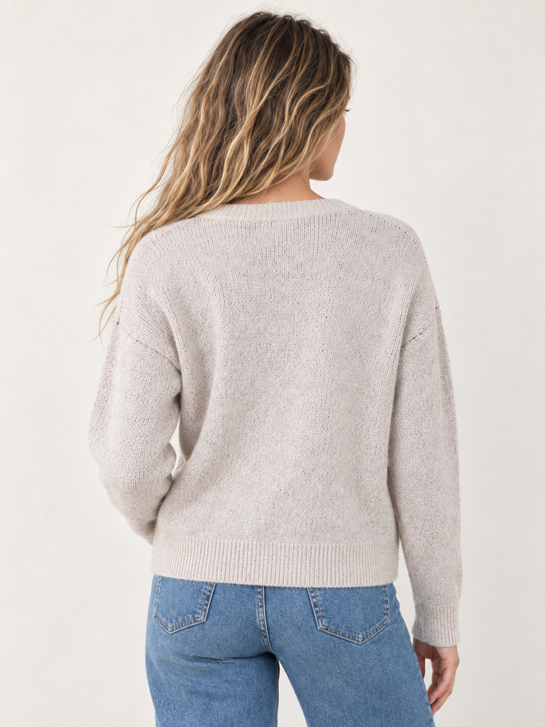 Model wearing Fox Graphic Sweater Taupe — back view
