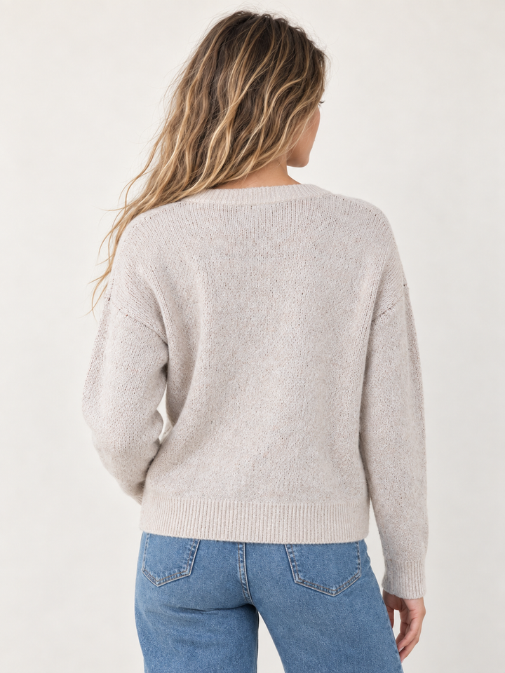 Model wearing Fox Graphic Sweater Taupe — back view