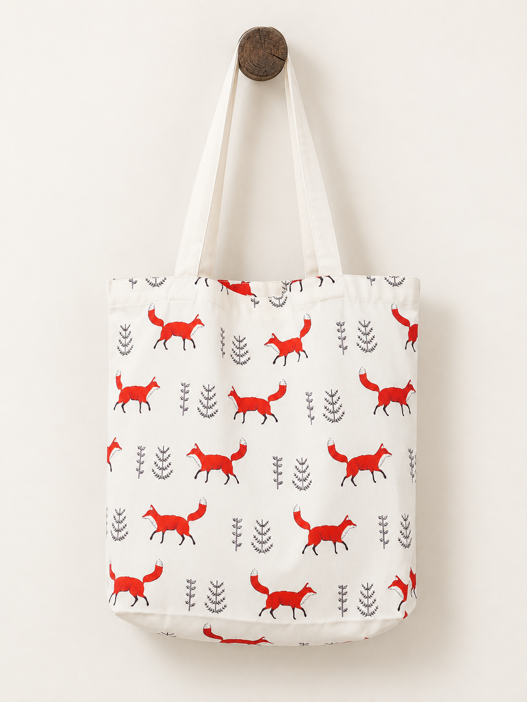 Fox tote bag hanging from wooden wall post