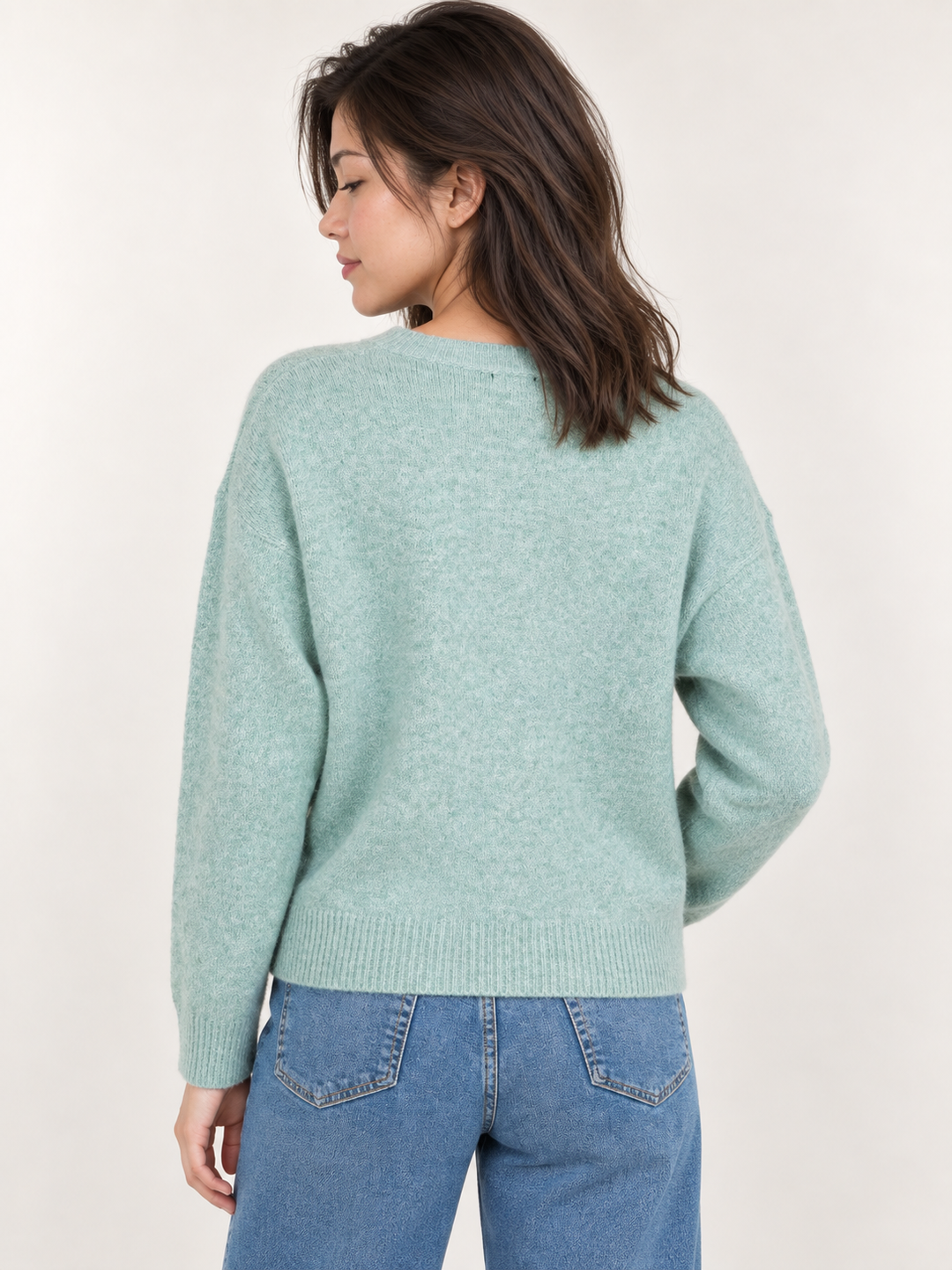 Model wearing Frenchie Dog Sweater Mint, back view