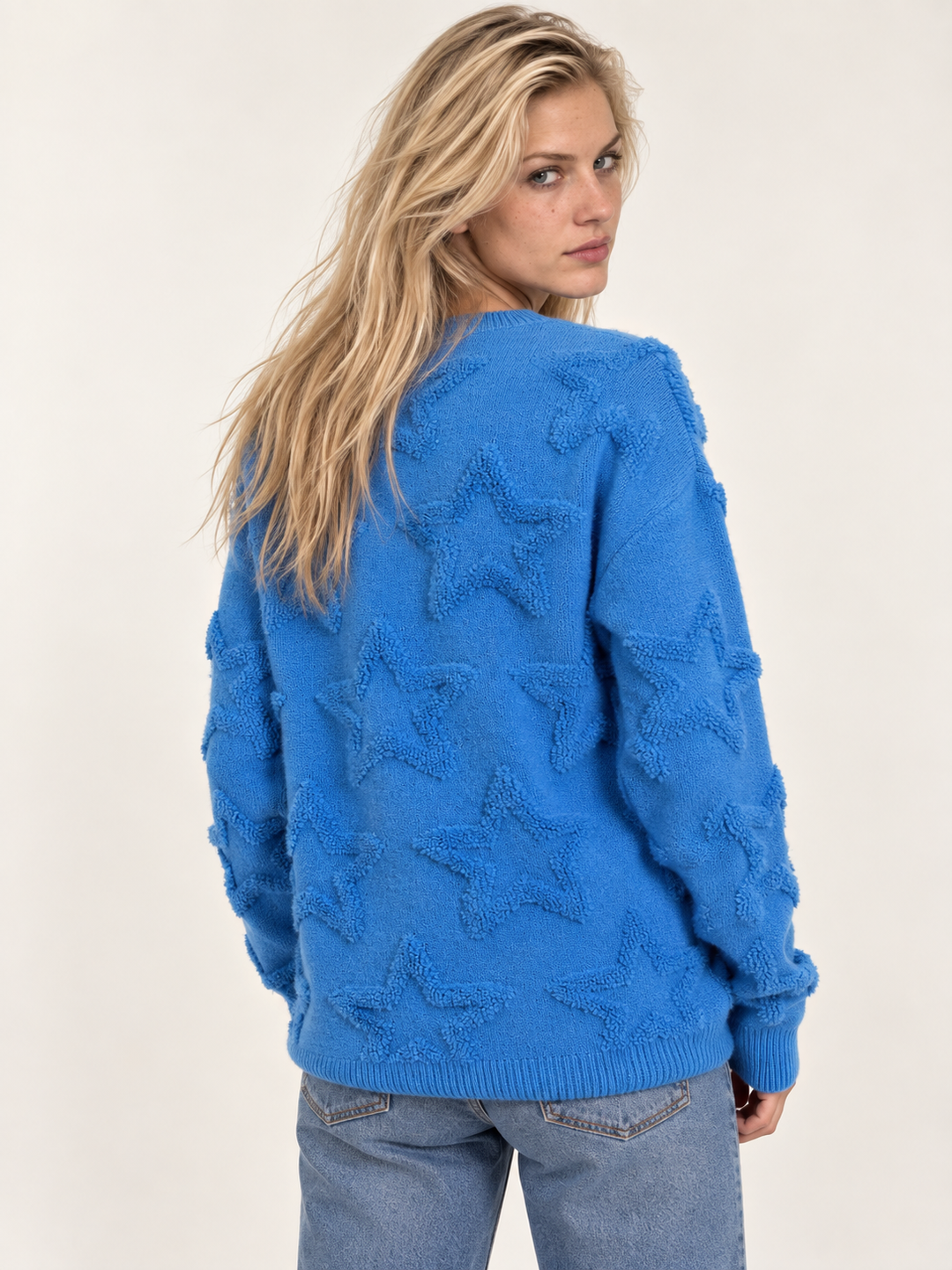 Fuzzy Star Sweater Blue – back view on model