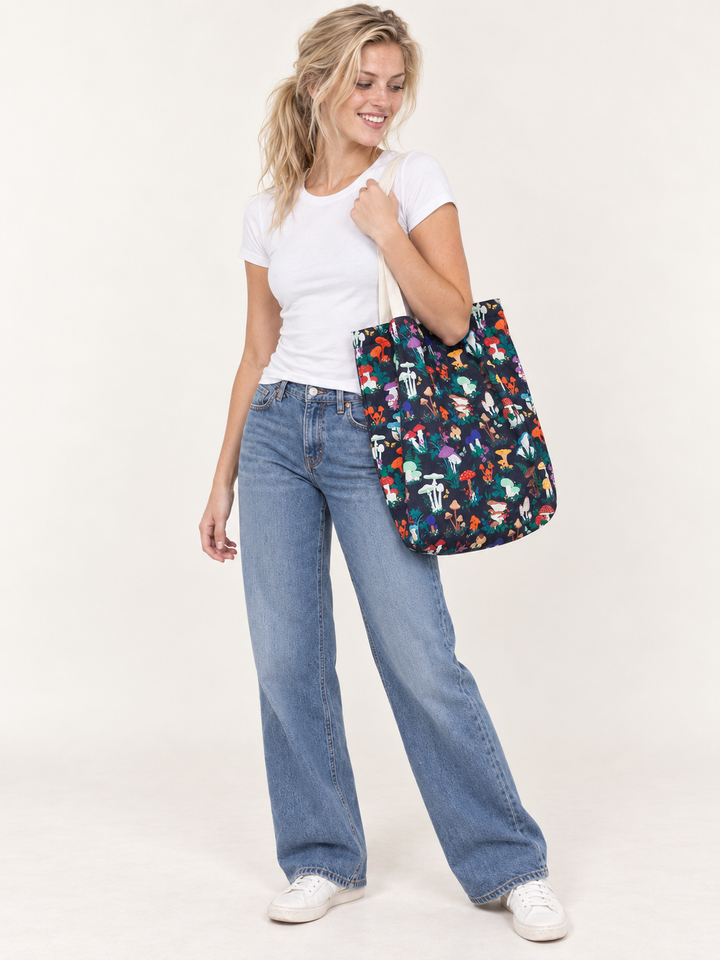 Model wearing the Garden Mushroom Tote Bag over her shoulder