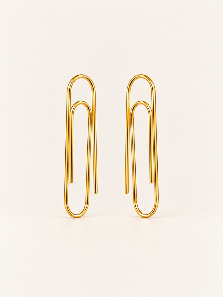 Gold Paperclip Earrings shown on a warm neutral background