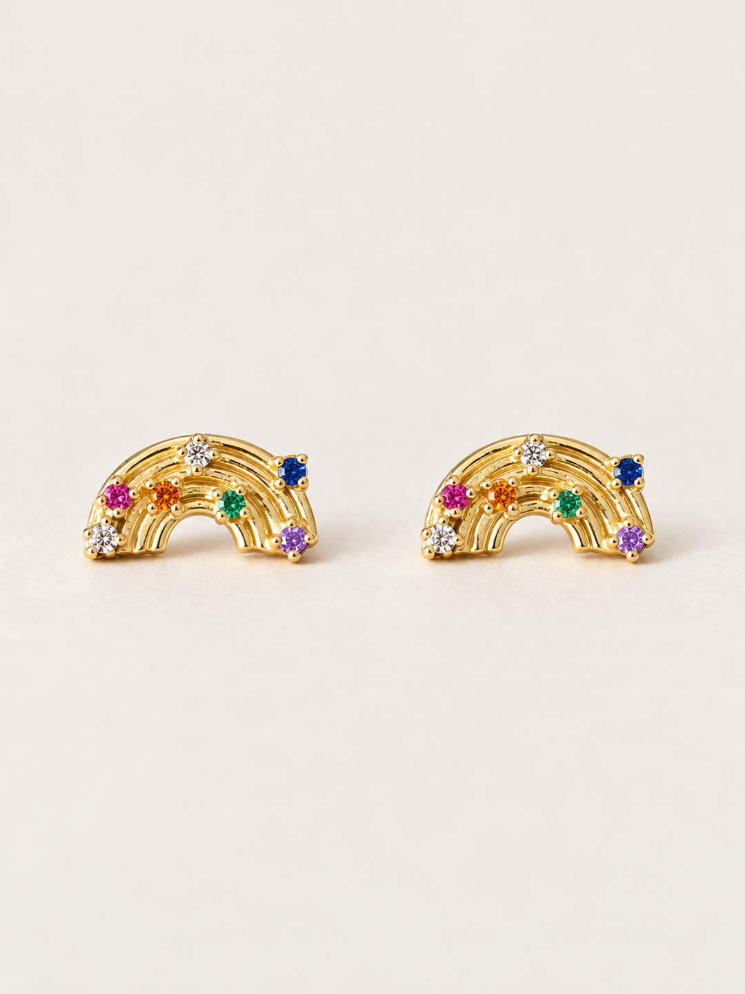 Rainbow Stud Earrings shown on a warm neutral background