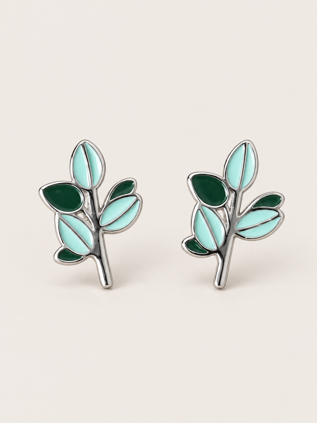 Green Leaf Stud Earrings shown on a warm neutral background