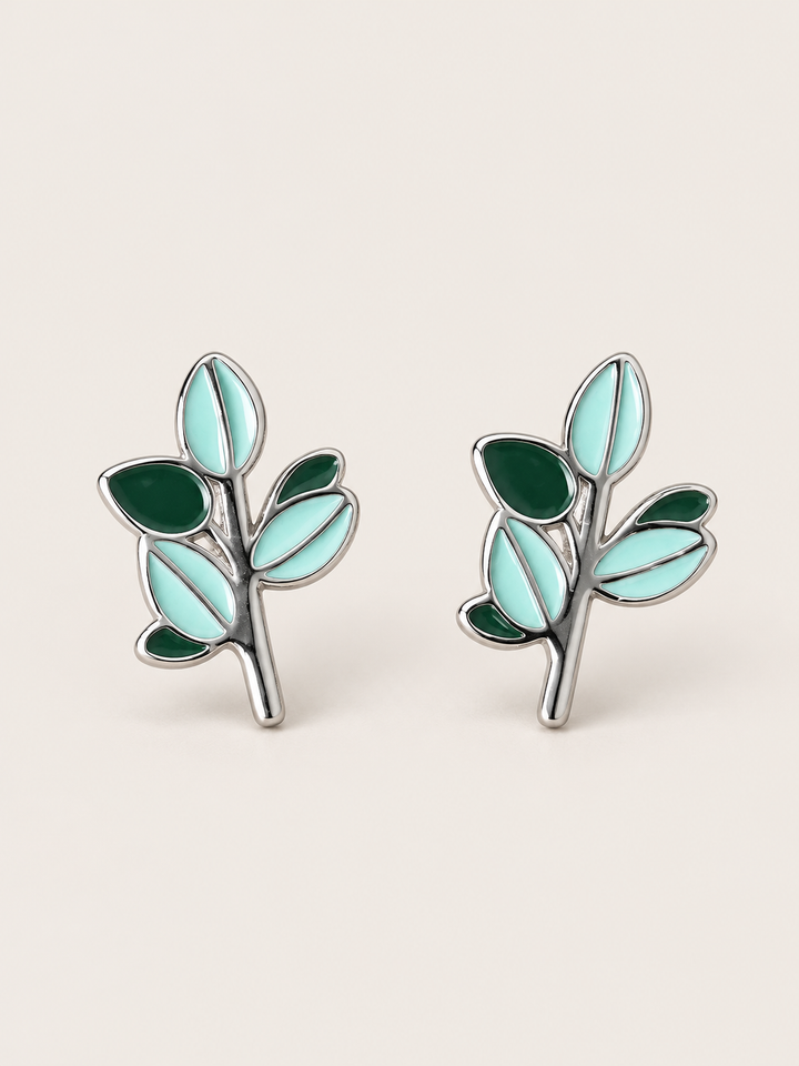 Green Leaf Stud Earrings shown on a warm neutral background