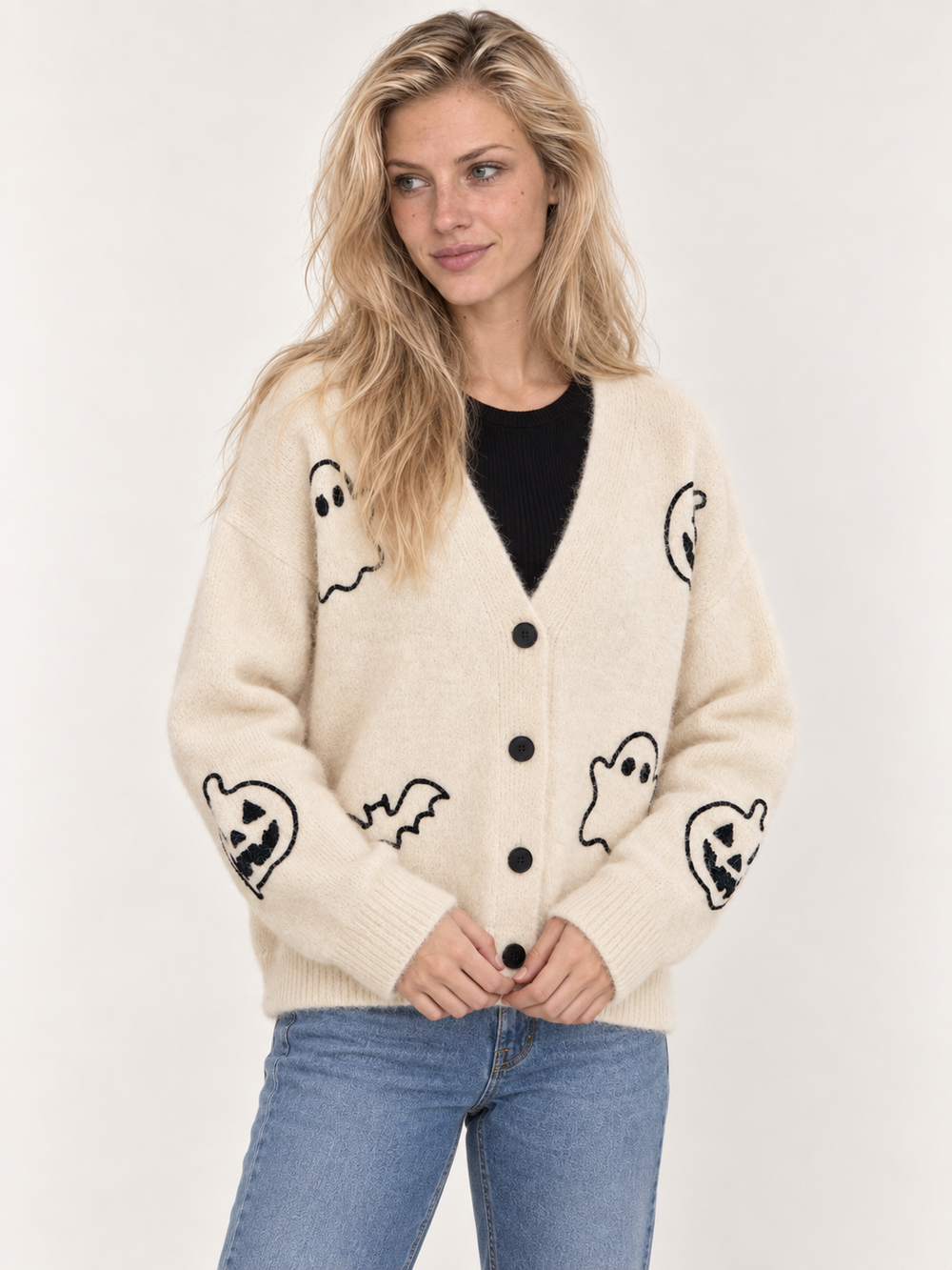 Halloween Cardigan Ghost Pumpkin Ivory three-quarter view on model