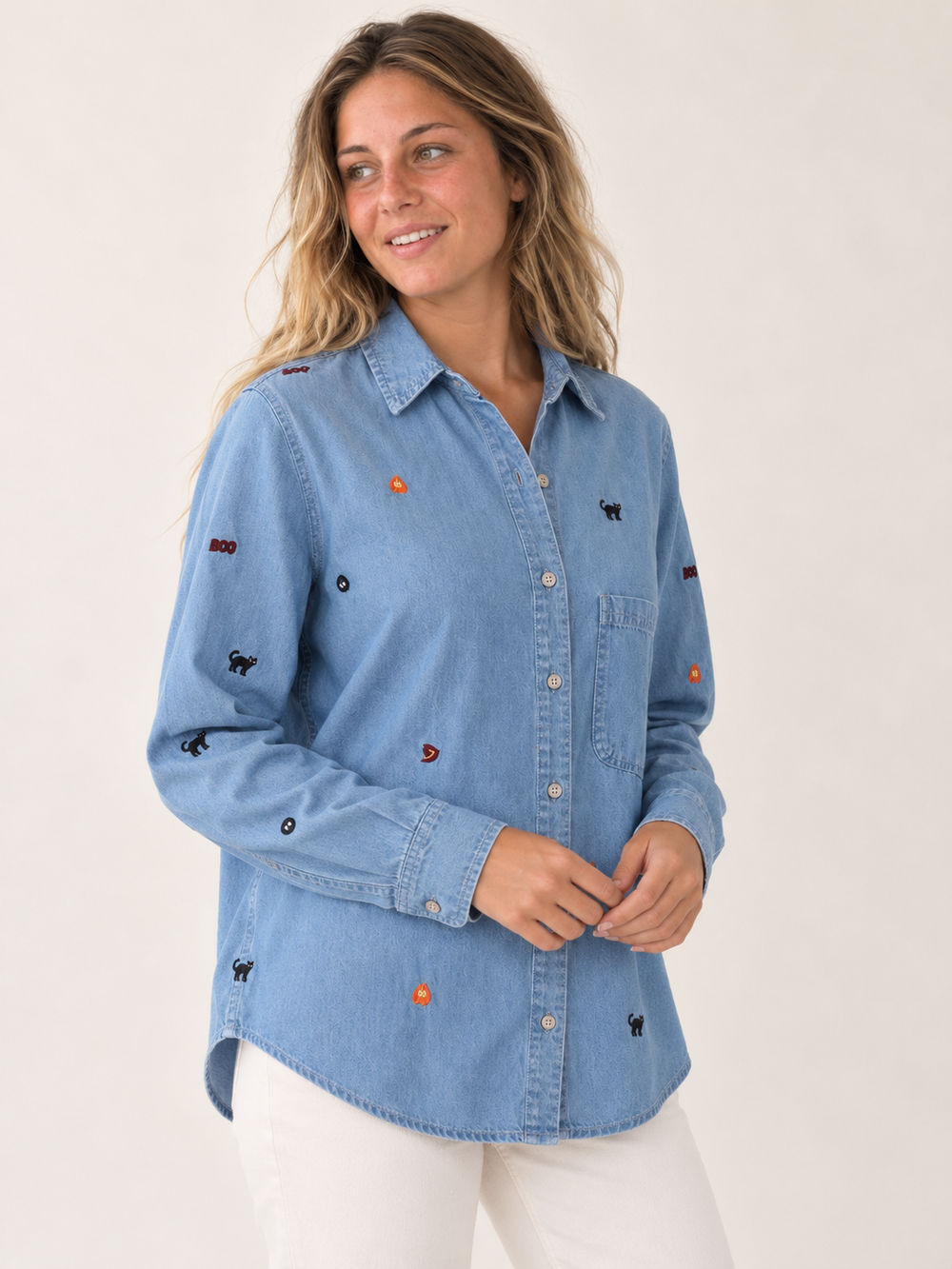Three-quarter view of model wearing Halloween Cat Button Down Shirt Blue