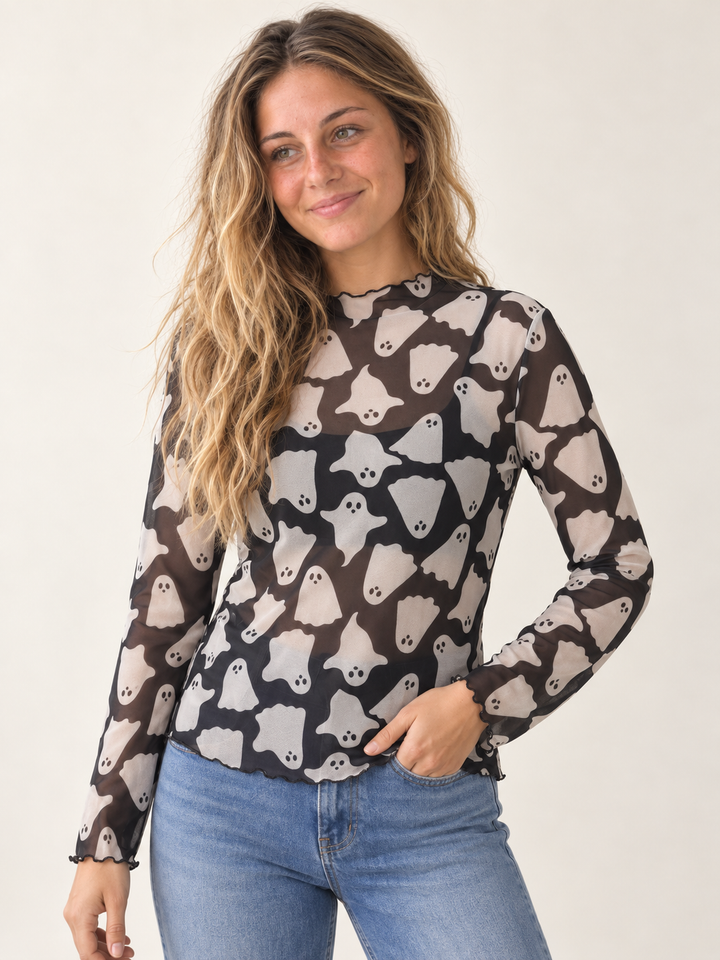 Halloween sheer ghost long sleeve top — three-quarter model view