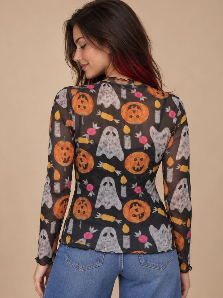 Model wearing Halloween sheer long sleeve spooky top, back view
