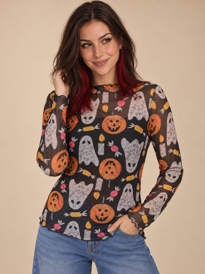 Model wearing Halloween sheer long sleeve spooky top, front view
