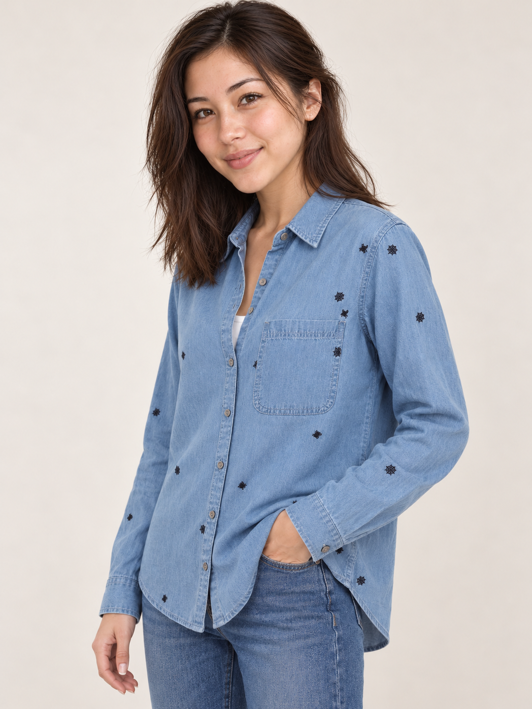 Model wearing Halloween spider button-down shirt, 45-degree view