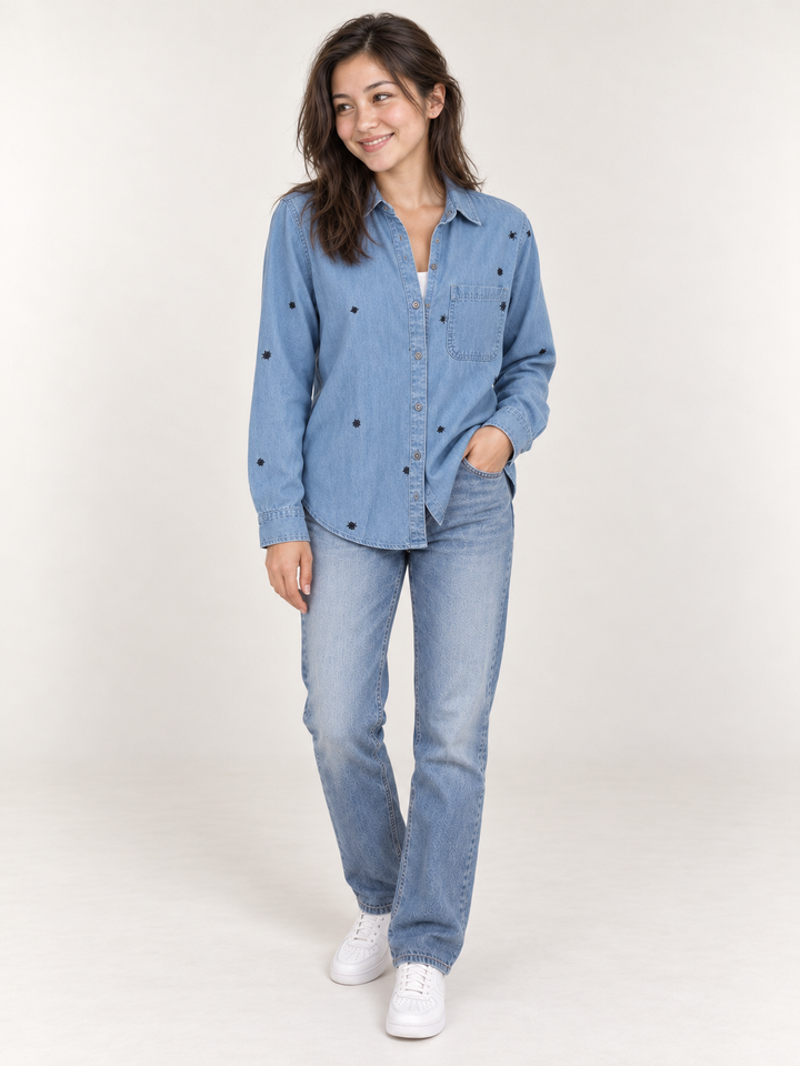 Model wearing Halloween spider button-down shirt, full-body front view