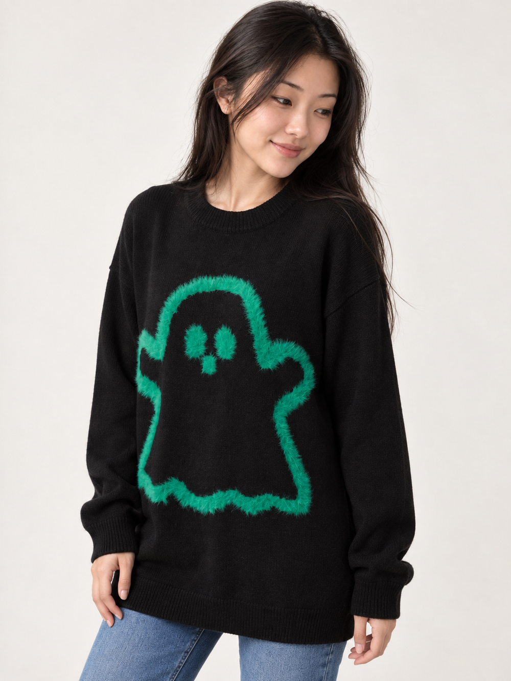Black fuzzy ghost sweater, angled view on model