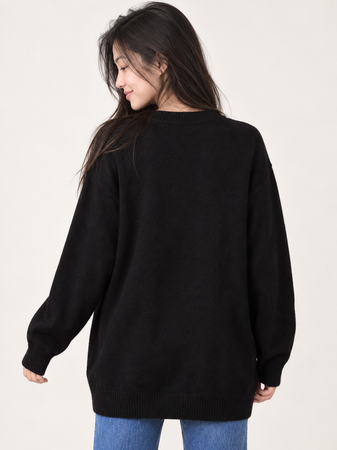 Black fuzzy ghost sweater, plain back view on model