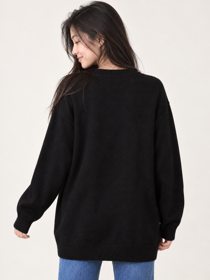 Black fuzzy ghost sweater, plain back view on model