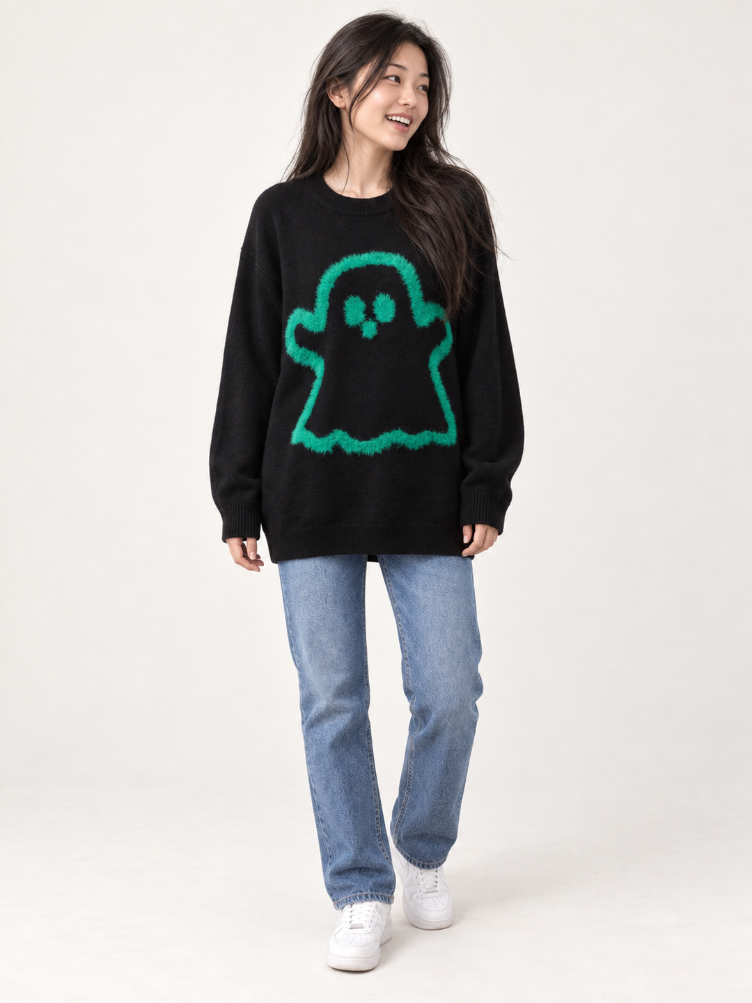 Black fuzzy ghost sweater with straight-leg jeans, full-body front view