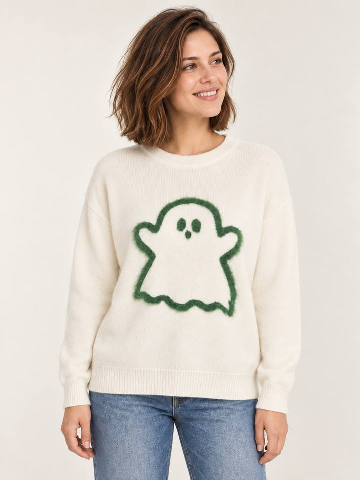 Ivory sweater with fuzzy green ghost design, front view on model