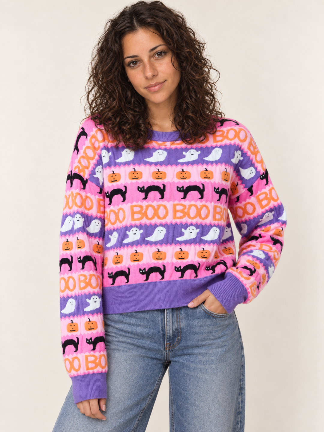 Model wearing Halloween Sweater Pink Purple Stripes Boo Ghost Cat, front view