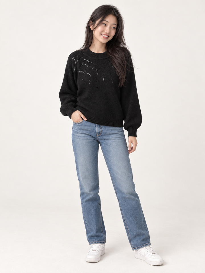 Model wearing Halloween Sweater Spider Web, full-body view