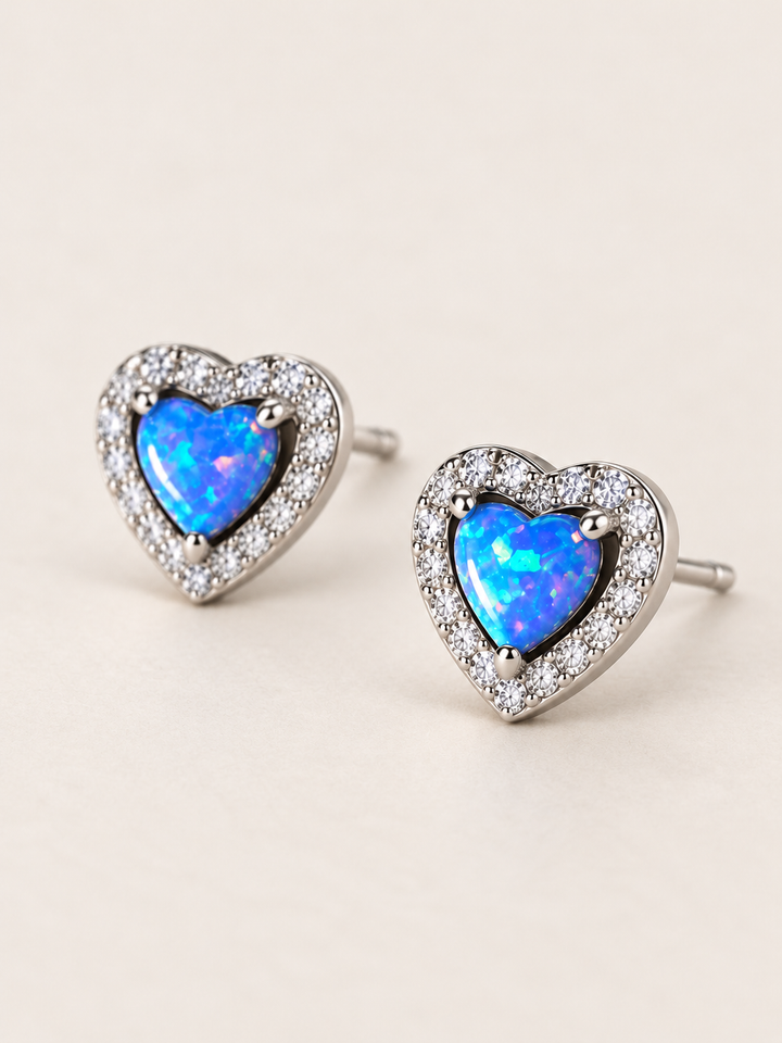 Blue Heart Halo Stud Earrings shown at a 45 degree angle