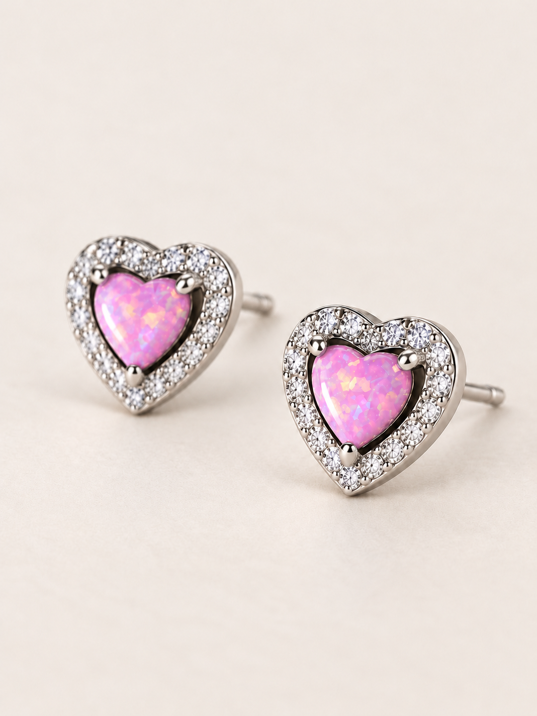 Pink Heart Halo Stud Earrings shown at a 45 degree angle