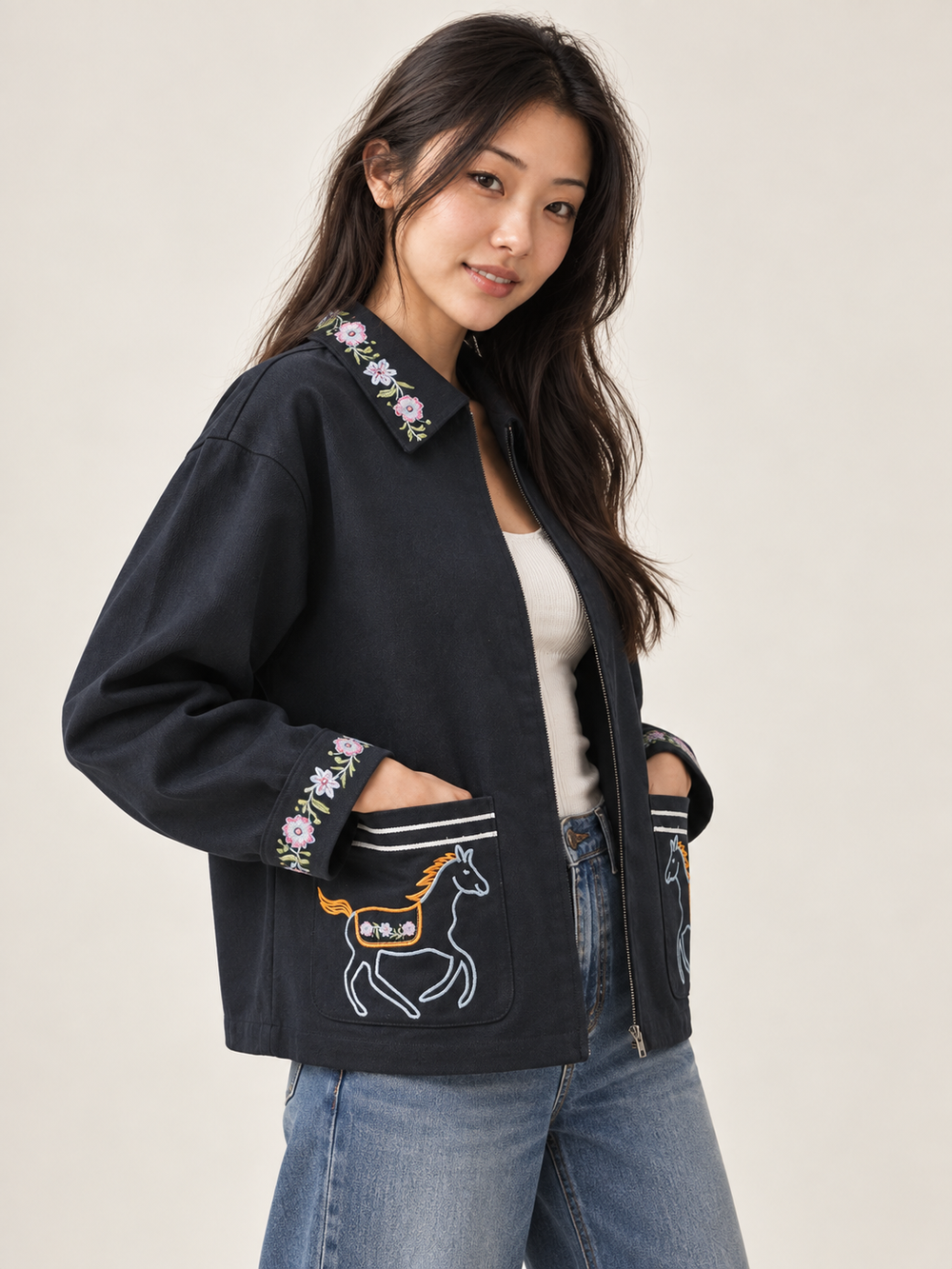 Model wearing Horse Embroidered Cotton Navy Jacket, angled view