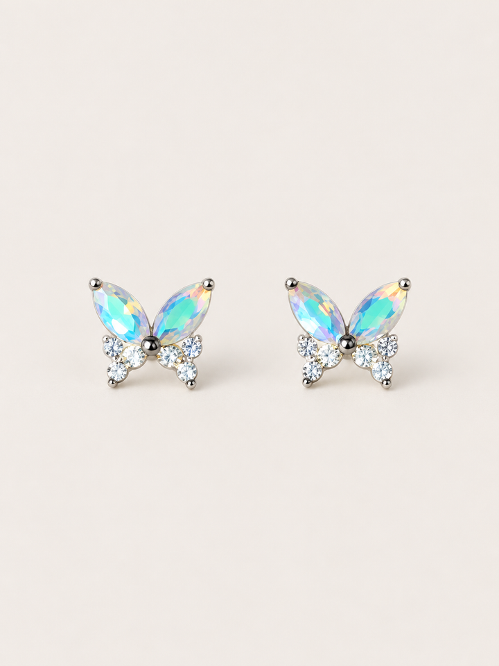 Iridescent Butterfly Stud Earrings shown on a warm neutral background