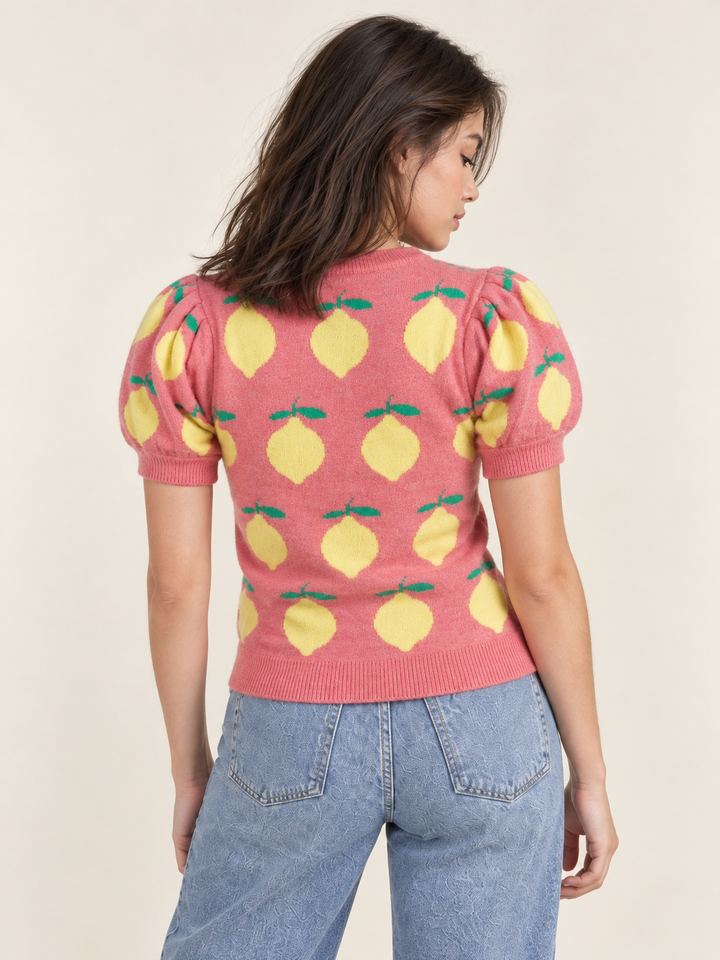 Model wearing Lemon Knit Puff Sleeve Top, back view