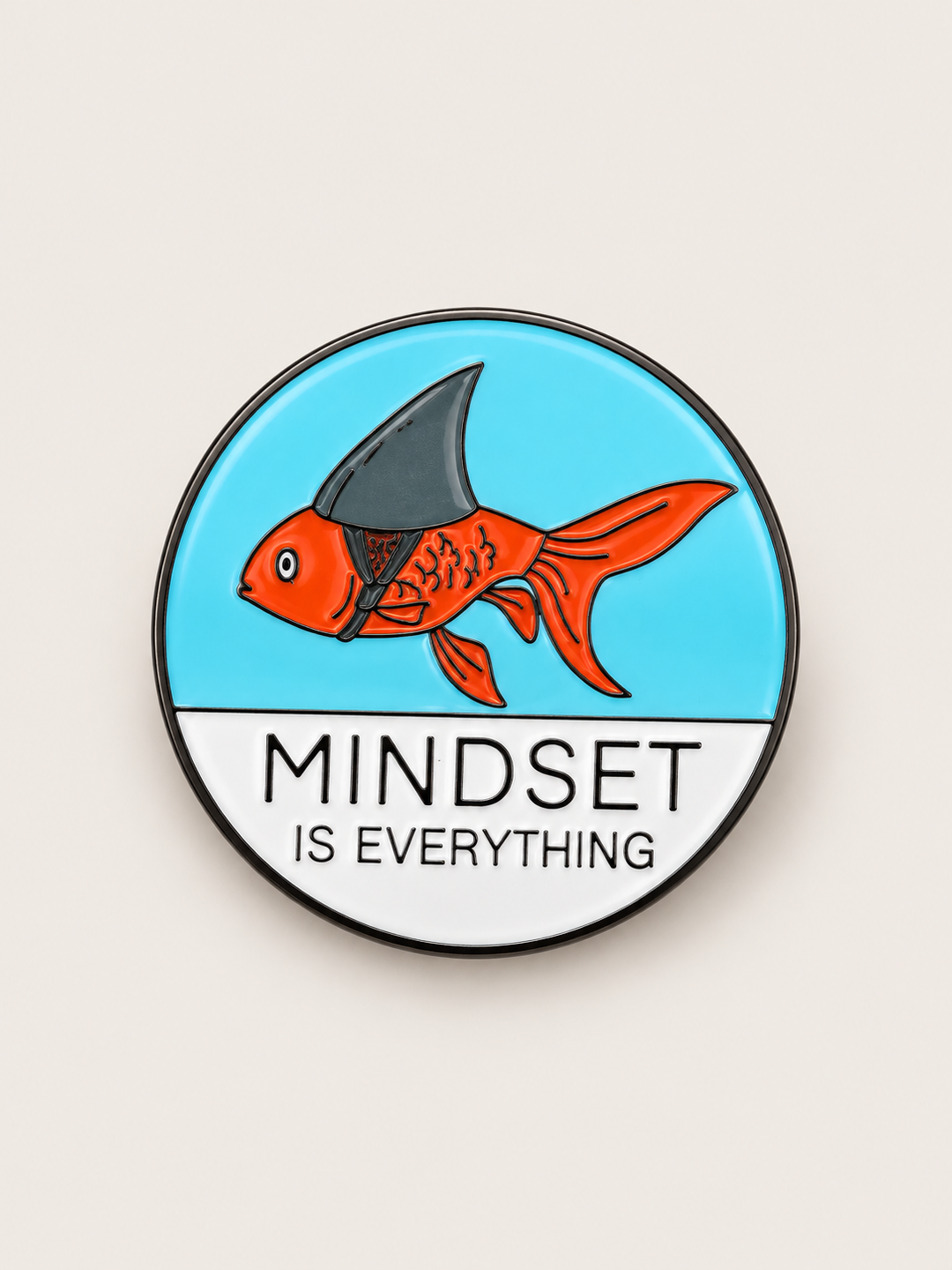 Mindset Is Everything Fish Pin shown on a warm neutral background
