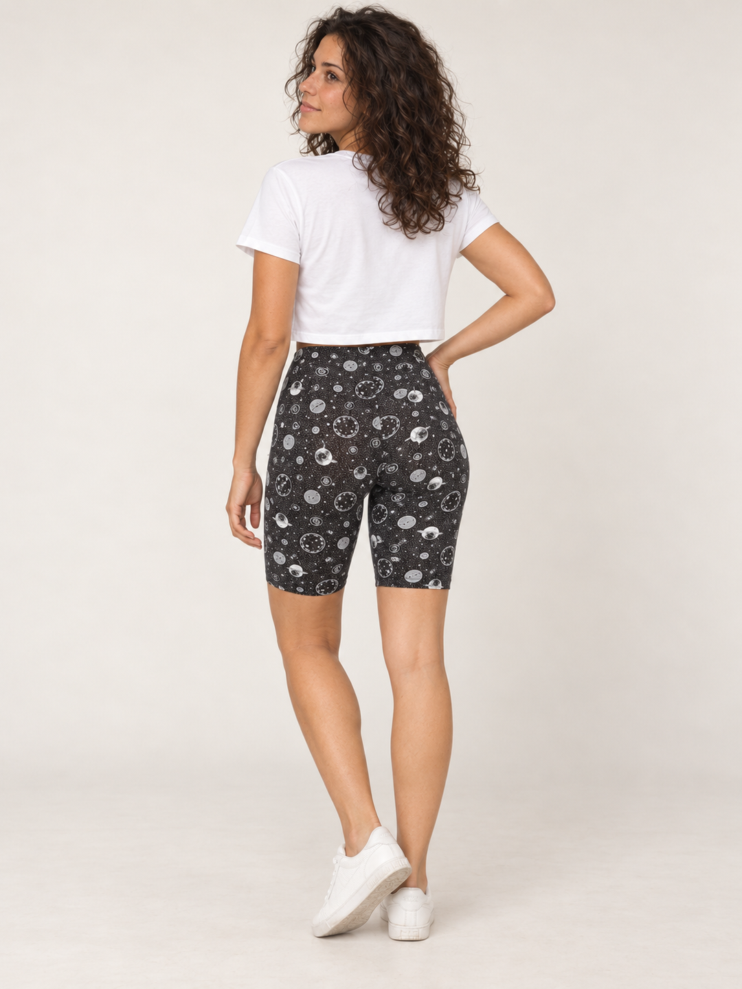 Model wearing Moon Biker Shorts, full-body back view