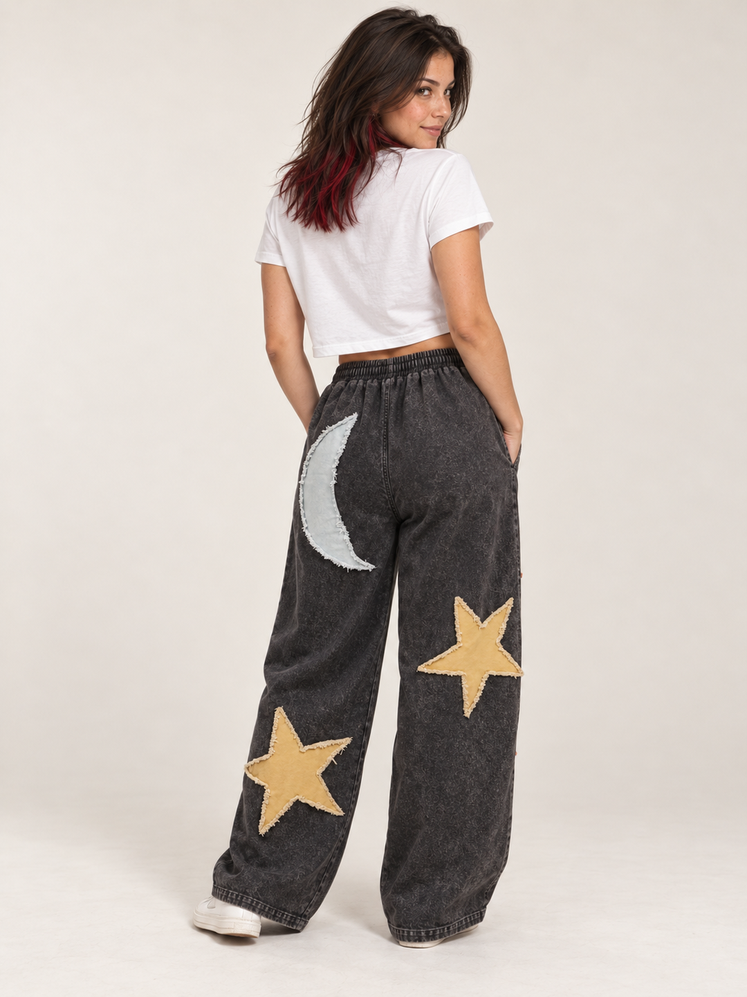 Model wearing Moon and Star Patchwork Wide Leg Pants, back view