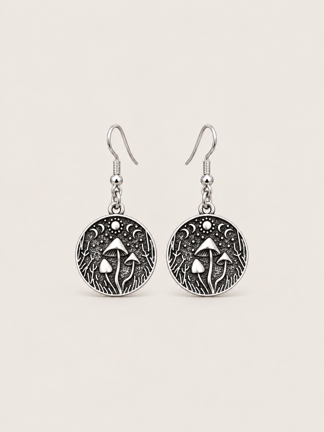 Mushroom Forest Drop Earrings shown on a warm neutral background