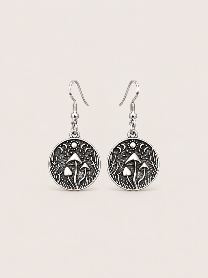 Mushroom Forest Drop Earrings shown on a warm neutral background