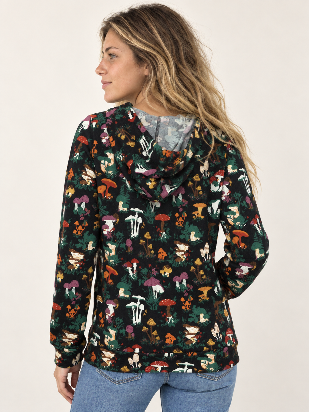 Model wearing Mushroom Garden Hoodie, back view