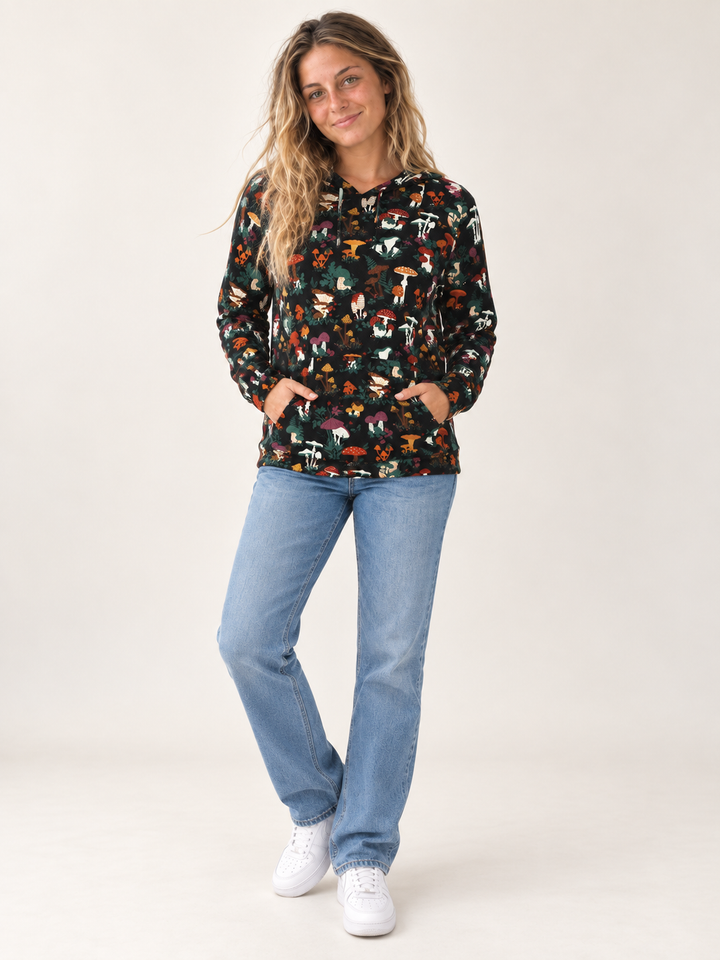 Model wearing Mushroom Garden Hoodie, full-body front view