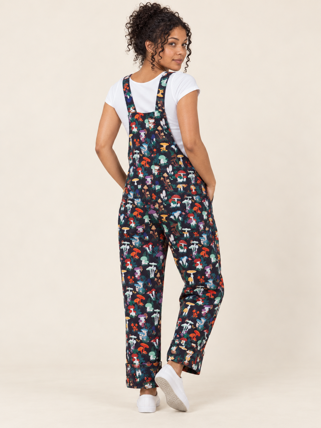 Model wearing Mushroom Garden Overalls, back view