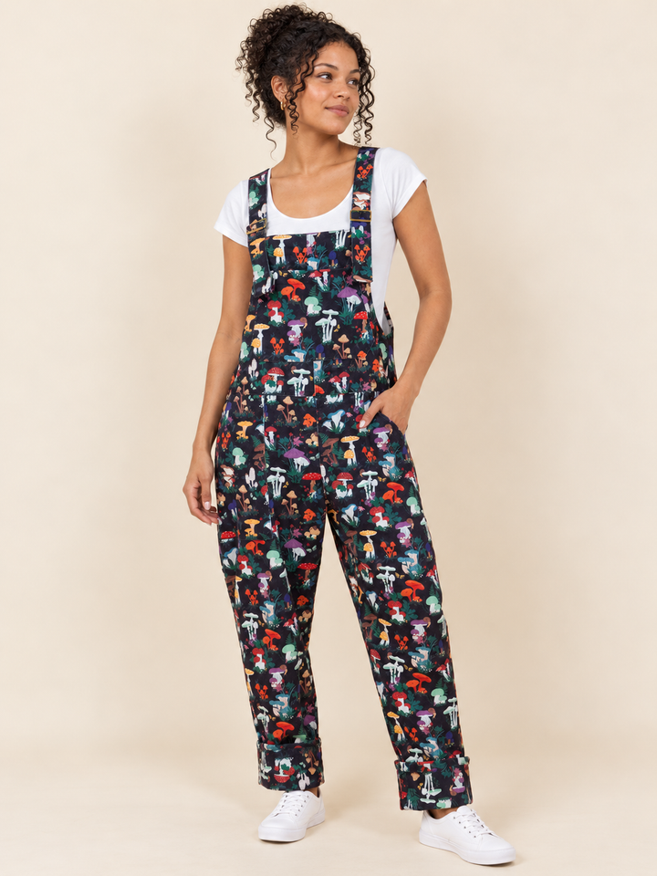 Model wearing Mushroom Garden Overalls, front view