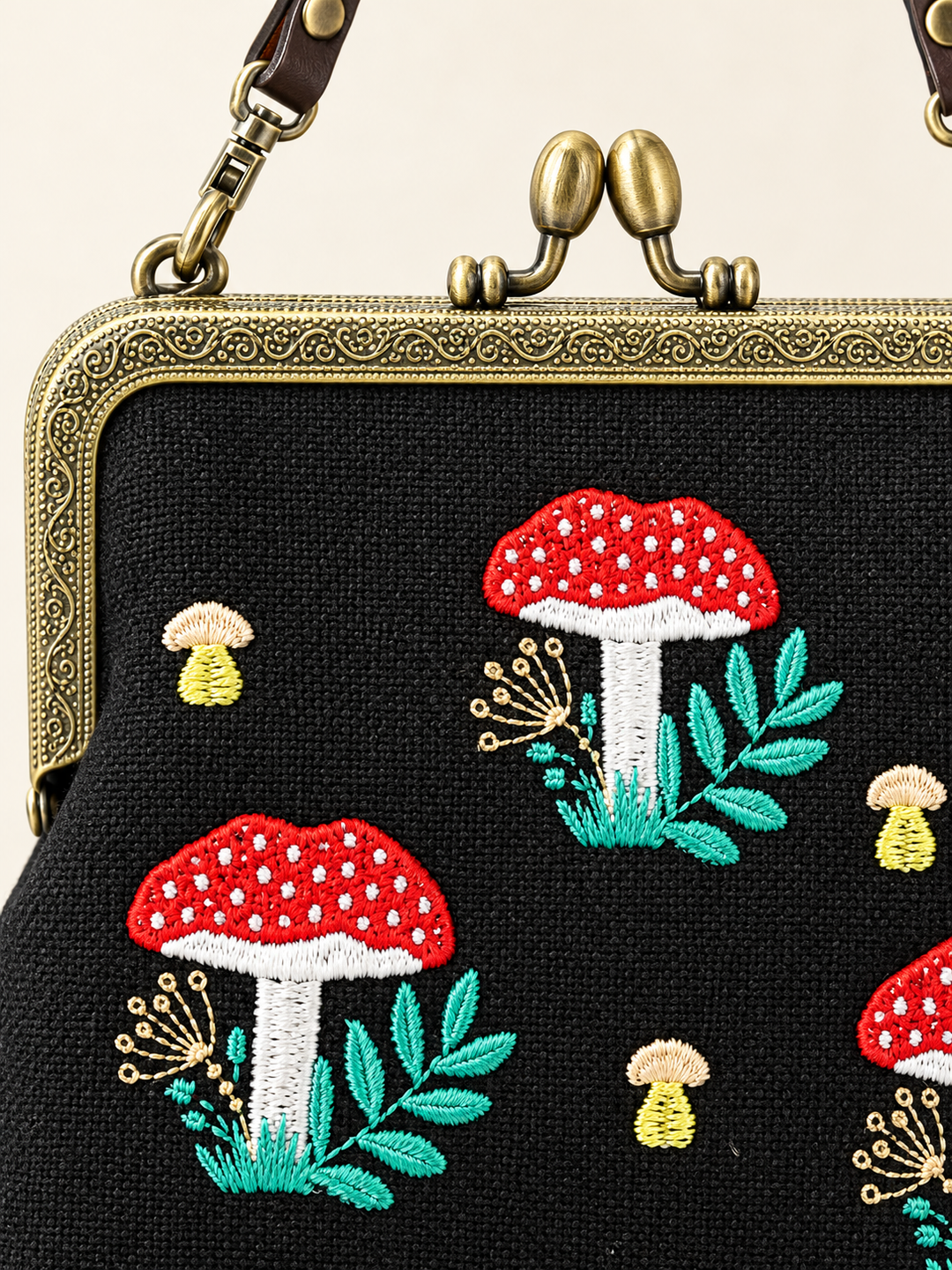 Close-up of Mushroom Kisslock Bag embroidery and kisslock frame