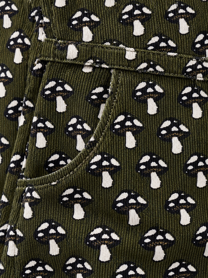 Mushroom Overall Dress Green corduroy mushroom fabric close-up