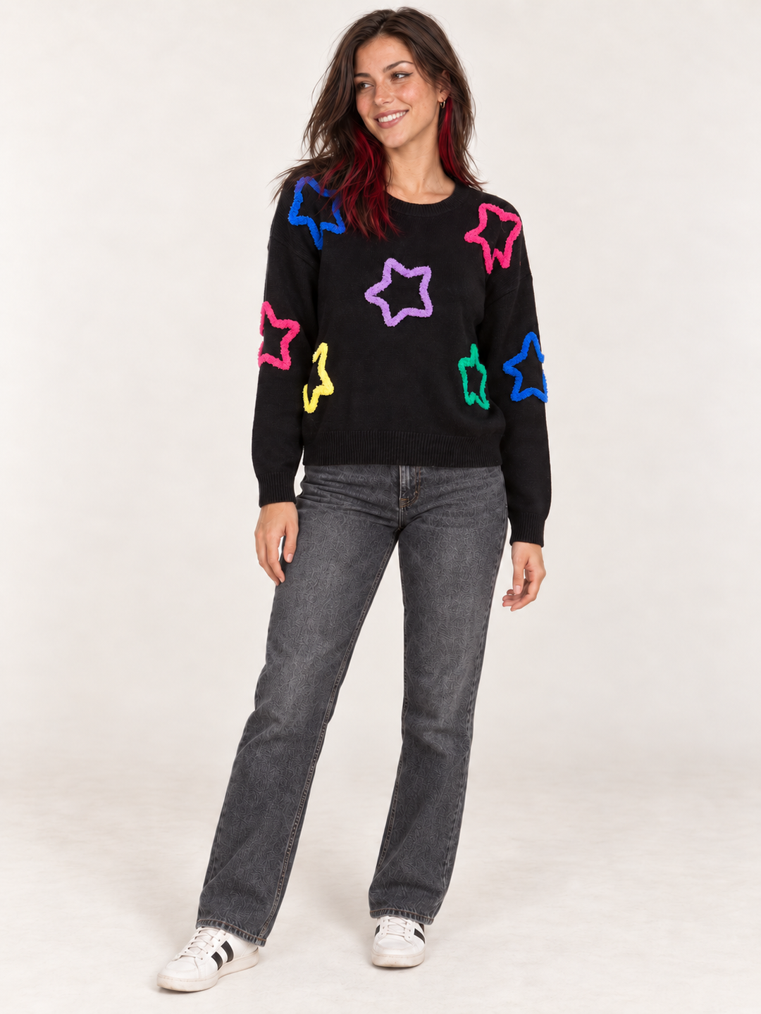 Model wearing Neon Fuzzy Star Sweater, full body view