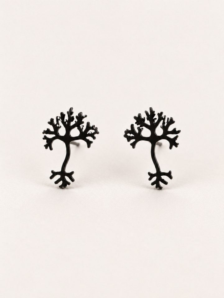 Black stainless steel Neuron Stud Earrings shown angled on a warm neutral background