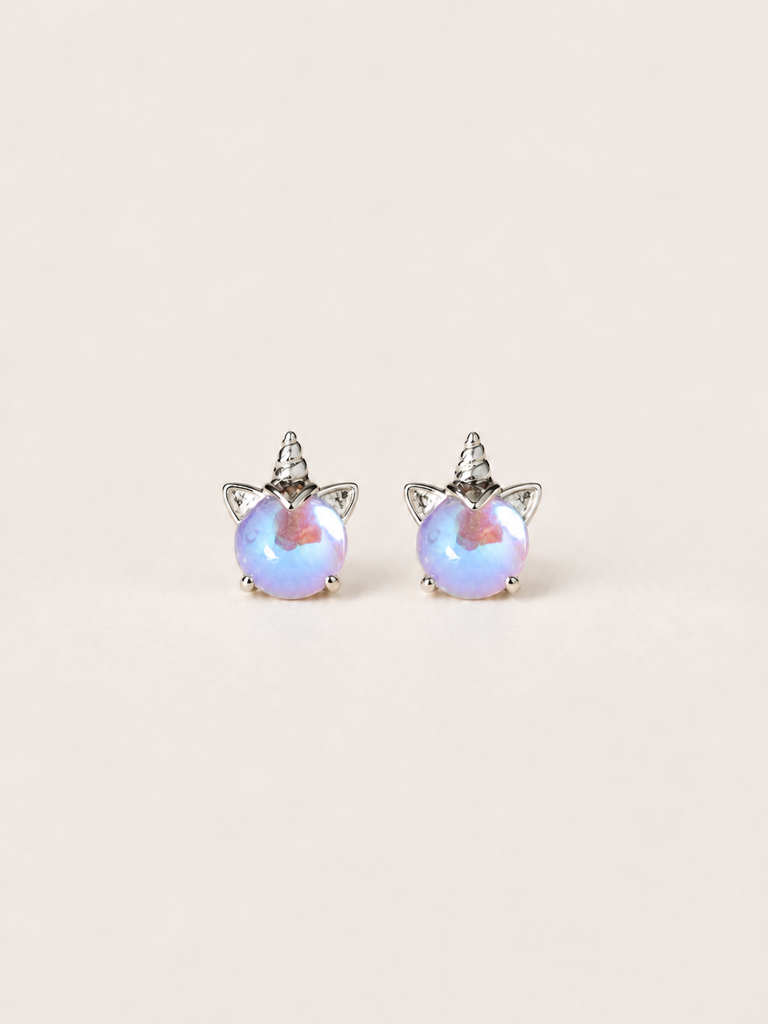 Opal Unicorn Stud Earrings shown on a warm neutral background