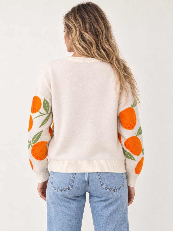 Orange sweater back view on model