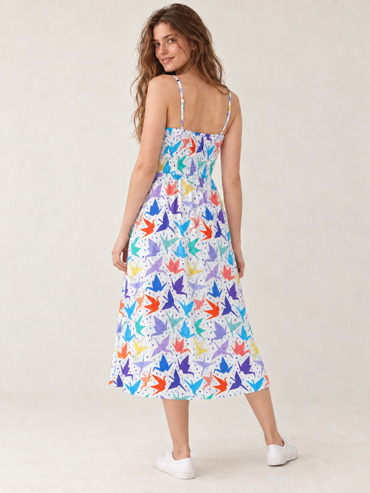 Model wearing Origami Crane Faux Button Down Dress, back view
